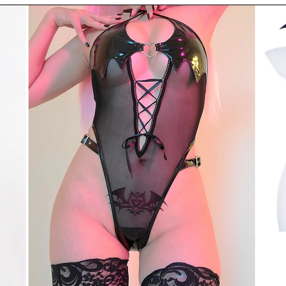 Sheer succubus black bodysuit.